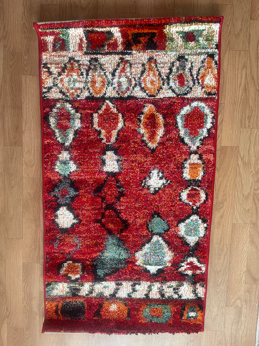 Tapis berbère rouge – 60x110 cm – Motifs ethniques chaleureux